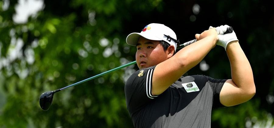 A picture of golfer Tom Kim